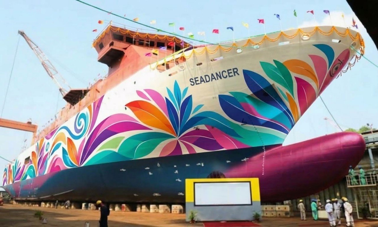 Two Seamax luxury ships sailing at sunset